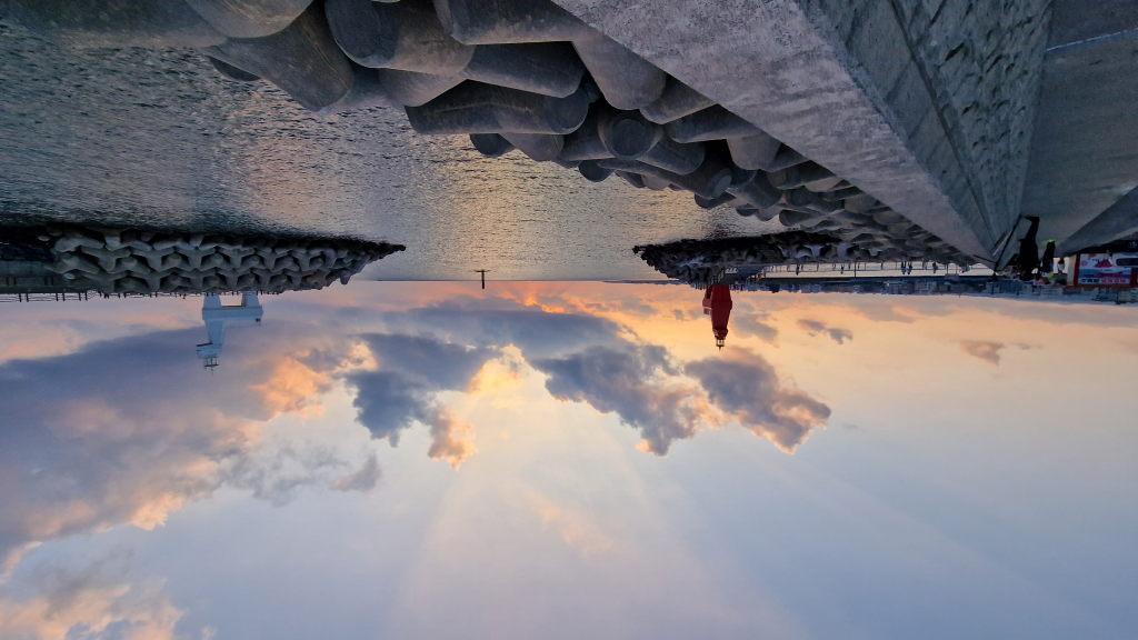 Roter und weißer Leuchtturm Iho Tewoo Jeju Sonnenuntergang Panorama